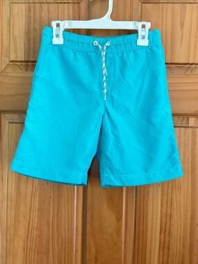 Lands’ End boys size 8 turquoise swim trunks with elastic and drawstring waist